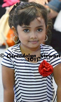 In the Audience at a Beauty Contest 
at the Plaza Ambarrukmo, Yogyakarta, Indonesia, Photographed by 
Gwendolyn Stewart c. 2014; All Rights Reserved